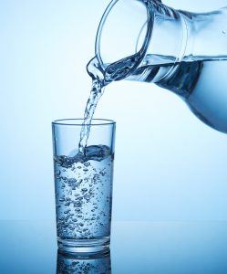 Common Water Disinfecting Method May Result In Toxic Byproducts, Study Finds DBPs Image credit: Marissa Lanterman / Johns Hopkins University Toxic and carcinogenic compounds are produced when phenols in drinking water mix with chlorine, the most common chemical used to disinfect drinking water in the U.S. Chlorine, the most common chemical used to disinfect drinking water in the United States, creates previously unidentified toxic byproducts in the very water its meant to disinfect, according to a new study from researchers at Johns Hopkins and the University of California, Berkeley, as well as in Switzerland. The researchers' findings were recently published in the journal Environmental Science & Technology. "There's no doubt that chlorine is beneficial; chlorination has saved millions of lives worldwide from diseases such as typhoid and cholera since its arrival in the early 20th century," says Carsten Prasse, an assistant professor of Environmental Health and Engineering at Johns Hopkins and the paper's lead author. "But that process of killing potentially fatal bacteria and viruses comes with unintended consequences. The discovery of these previously unknown, highly toxic byproducts raises the question of how much chlorination is really necessary." Phenols, chemical compounds that occur naturally in the environment and are abundant in personal care products and pharmaceuticals, are also commonly found in drinking water. When these phenols mix with chlorine, the process creates a large number of byproducts. Current analytical chemistry methods, however, are unable to detect and identify all of these byproducts, some which may be harmful and can cause long-term health consequences, says Prasse. For the study, Prasse and his collaborators added N-α-acetyl-lysine, which is almost identical to the amino acid lysine that makes up many proteins in our bodies, to detect reactive electrophiles, harmful compounds which have been linked to a variety of diseases. The technique of identifying compounds based on their reaction with biomolecules like DNA and proteins is commonly used in the field of toxicology. The researchers first chlorinated water using commercial methods: they added excess chlorine, which ensures sufficient disinfection but also eliminates harmless smell and taste compounds that consumers often complain about. Then the team added the aforementioned amino acid, let the water incubate for one day, and used mass spectrometry, a method of analyzing chemicals, to detect the electrophiles that reacted with the amino acid. Their experiment found the compounds 2-butene-1,4-dial, or BDA, and chloro-2-butene-1,4-dial, or BDA with chlorine attached. BDA is a very toxic compound and a known carcinogen that, until this study, scientists had not detected in chlorinated water before, says Prasse. While Prasse stresses that this is a lab-based study and the presence of these novel byproducts in real drinking water has not been evaluated, the findings also raise the question about the use of alternative methods to disinfect drinking water, including the use of ozone, UV treatment, or simple filtration. "In other countries, especially in Europe, chlorination is not used as frequently, and the water is still safe from waterborne illnesses. In my opinion, we need to evaluate when chlorination is really necessary for the protection of human health and when alternative approaches might be better," Prasse says. He adds: "Our study also clearly emphasizes the need for the development of new analytical techniques that allow us to evaluate the formation of toxic disinfection by-products when chlorine or other disinfectants are being used. One reason regulators and utilities are not monitoring these compounds is that they don't have the tools to find them." Source: Johns Hopkins University