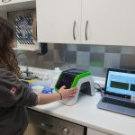Laboratory analyst running brewery wastewater samples on the peCOD analyzer.