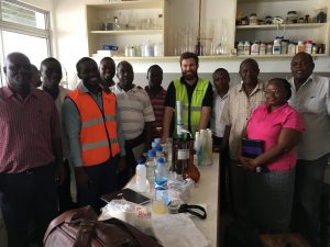 MANTECH Representative Justin Dickerman with KMFRI Laboratory Personnel Post-Training